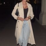 Chloe Sims in a Beige Trench Coat Arrives at Maine in Mayfair in London 08/02/2024