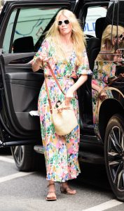 Claudia Schiffer in a Floral Dress