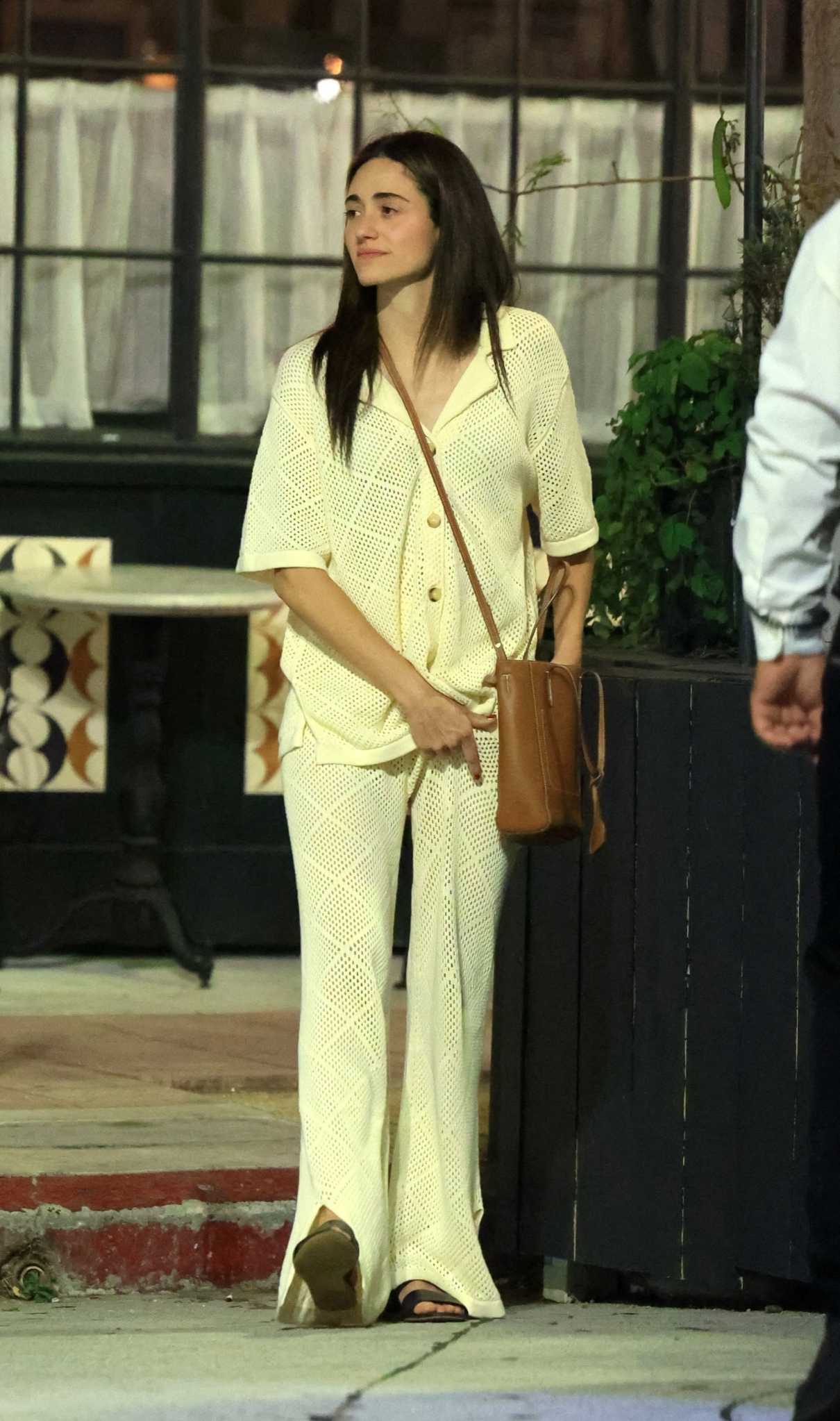 Emmy Rossum in a White Lace Ensemble