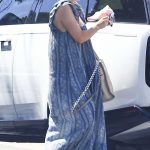 Kaley Cuoco in a Blue Patterned Dress Attends a Party with Her Sister Briana in Westlake Village 08/19/2024