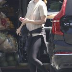 Kate Mara in a Beige Tee Grabs a Drink at the Market in Los Feliz 08/29/2024