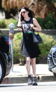 Krysten Ritter in a Black Tank Top