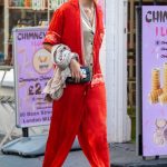 Maggie Grace in a Red Ensemble Was Seen Strolling Around in Central London 07/31/2024