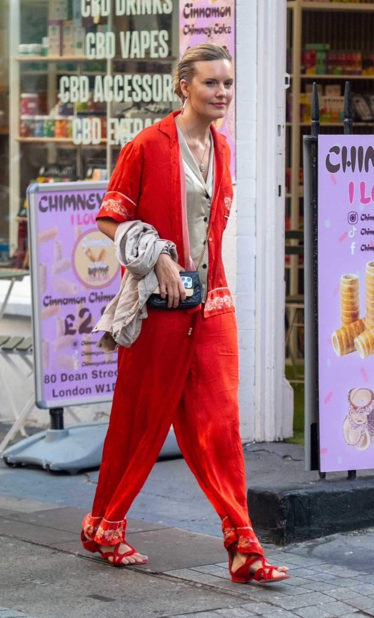 Maggie Grace in a Red Ensemble