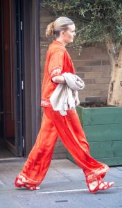 Maggie Grace in a Red Ensemble