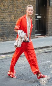 Maggie Grace in a Red Ensemble