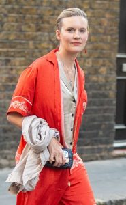 Maggie Grace in a Red Ensemble