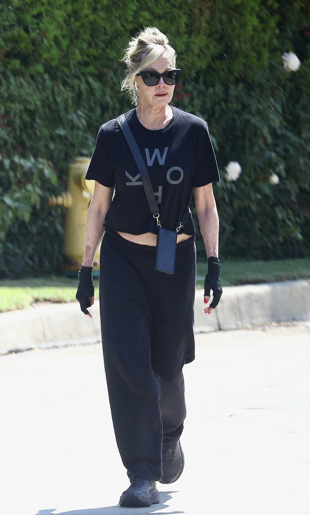 Melanie Griffith in a Black Tee