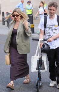 Mollie King in an Olive Blazer