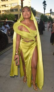 Whitney Adebayo in a Yellow Dress