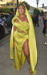 Whitney Adebayo in a Yellow Dress