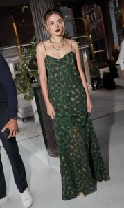 Charlotte Lawrence in a Green Dress