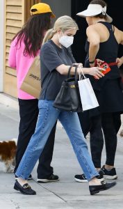 Emma Roberts in a Black Tee