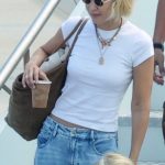 Gigi Hadid in a White Tee Arrives in Sardinia 08/28/2024