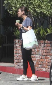 Mila Kunis in a White Sneakers