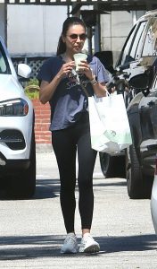 Mila Kunis in a White Sneakers