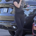 Lucy Hale in a Black Tee Arrives at a Gym in Los Angeles 09/25/2024