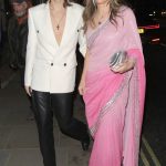 Elizabeth Hurley in a Pink Dress Arrives at Diwali Charity Dinner by International Institute of Fine Arts Modinagar with Her Son in London 10/16/2024