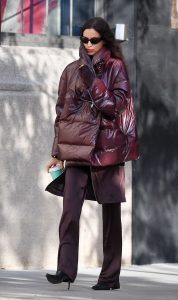 Irina Shayk in a Burgundy Puffer Jacket