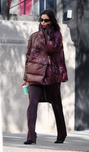 Irina Shayk in a Burgundy Puffer Jacket