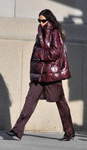 Irina Shayk in a Burgundy Puffer Jacket