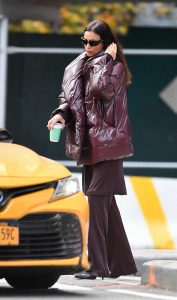 Irina Shayk in a Burgundy Puffer Jacket