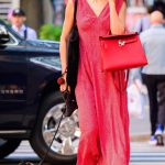 Irina Shayk in a Red Dress Steps Out for a Stroll with Her Dog in NYC 10/20/2024