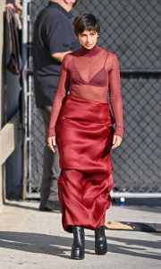 Naomi Scott in a Red See-Through Turtleneck