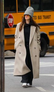 Anne Hathaway in a Beige Coat