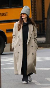 Anne Hathaway in a Beige Coat