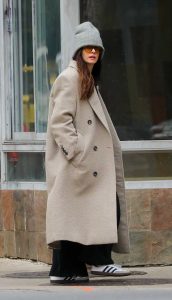 Anne Hathaway in a Beige Coat