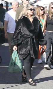 Bebe Rexha in a Black Fur Coat