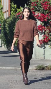 Caylee Cowan in a Brown Sweater