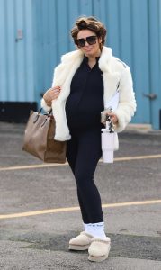 Charlotte Dawson in a White Fur Coat