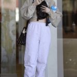 Dove Cameron in a White Sweatpants Leaves a Salon in Los Angeles 11/20/2024