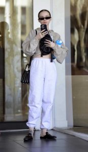 Dove Cameron in a White Sweatpants