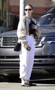 Dove Cameron in a White Sweatpants