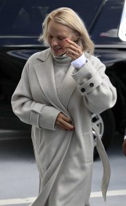 Pamela Anderson in a Grey Coat