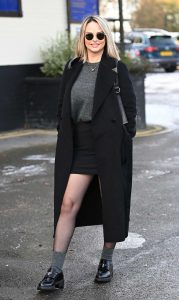 Rhian Sugden in a Black Coat