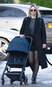 Rhian Sugden in a Black Coat