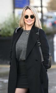 Rhian Sugden in a Black Coat