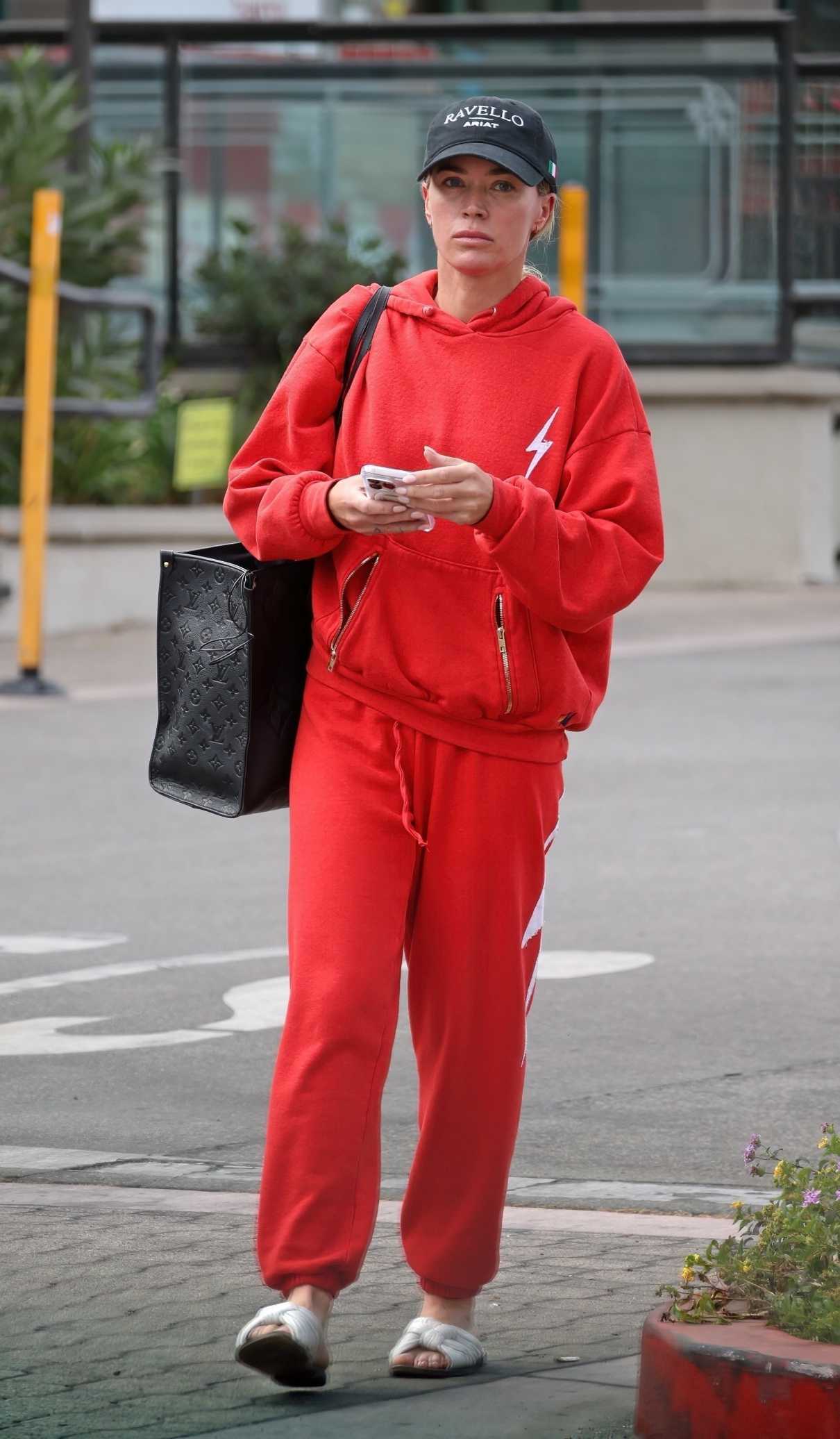 Teddi Mellencamp in a Red Sweatsuit