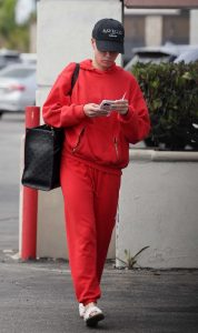 Teddi Mellencamp in a Red Sweatsuit