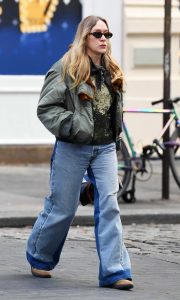 Chloe Sevigny in an Olive Bomber Jacket