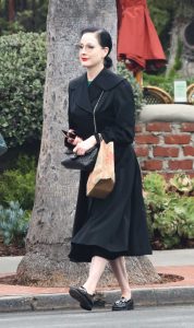 Dita Von Teese in a Black Coat