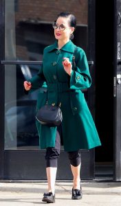 Dita Von Teese in a Turquoise Trench Coat