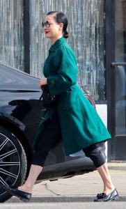 Dita Von Teese in a Turquoise Trench Coat