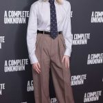 Elle Fanning Attends A Complete Unknown Photocall at The Curzon Mayfair in London 12/16/2024