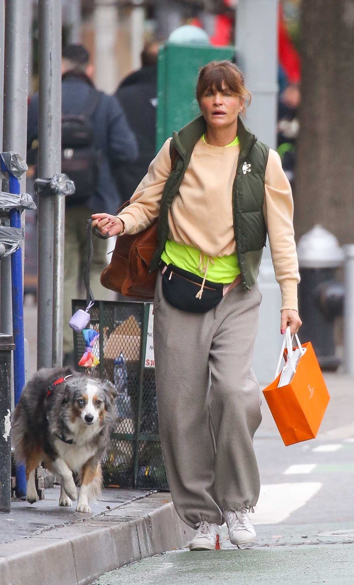 Helena Christensen in a White Sneakers