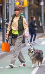 Helena Christensen in a White Sneakers